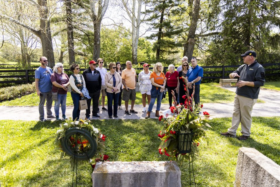group of people at grave site