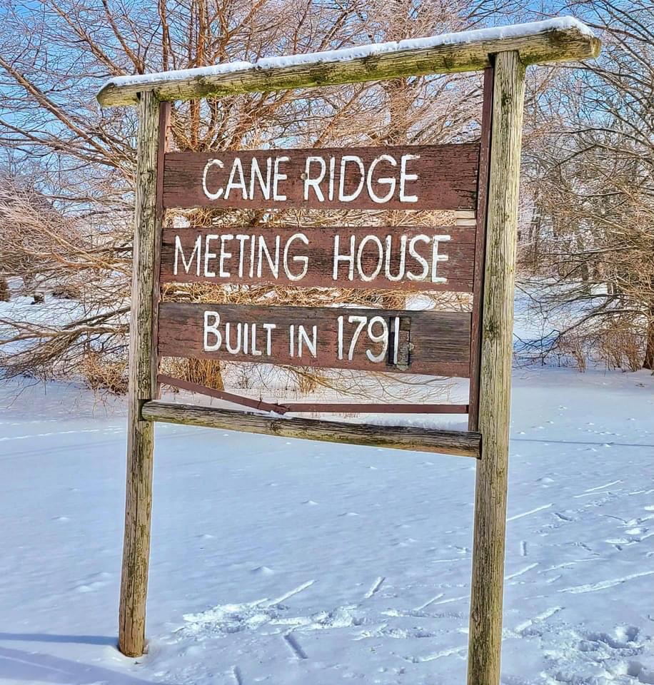 sign reading "Cane Ridge Meeting House"